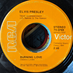 Elvis-burning-love-label.png